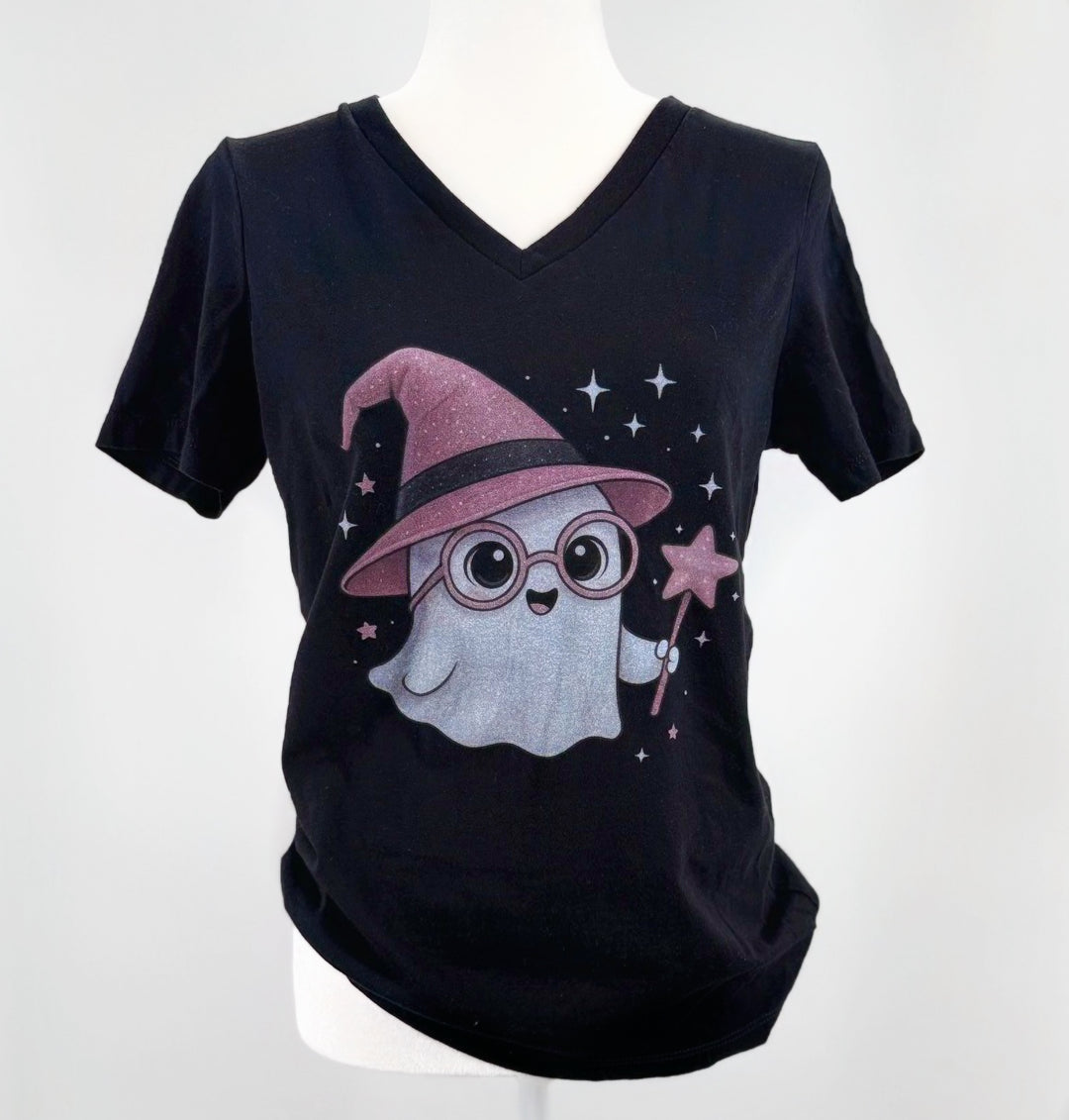 Black t-shirt with a ghost wearing a witch hat and glasses graphic on a white background